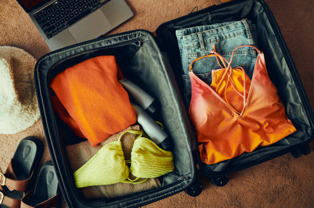 istock Packing for Adventure: Open Luggage Ready for Travel 2152890577