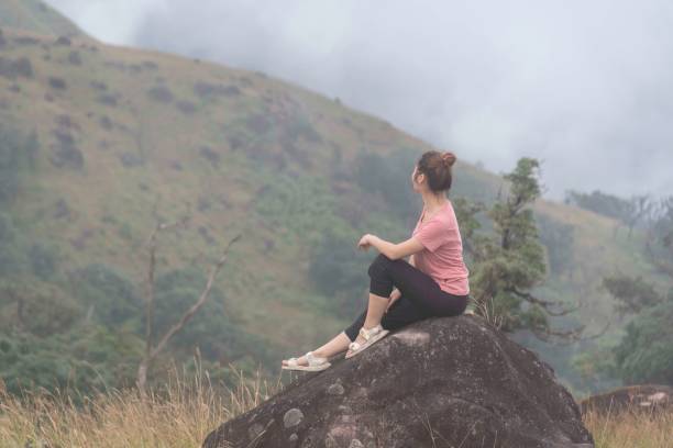 istock Hiker asian woman backpack walking trail activity camping outdoors and People exploring forest green natural capturing beauty nature outdoor. 2152891761