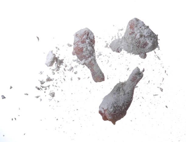 istock Crispy fried chicken,Flying coating chicken drunsticks with flour isolated on white background 2152892095