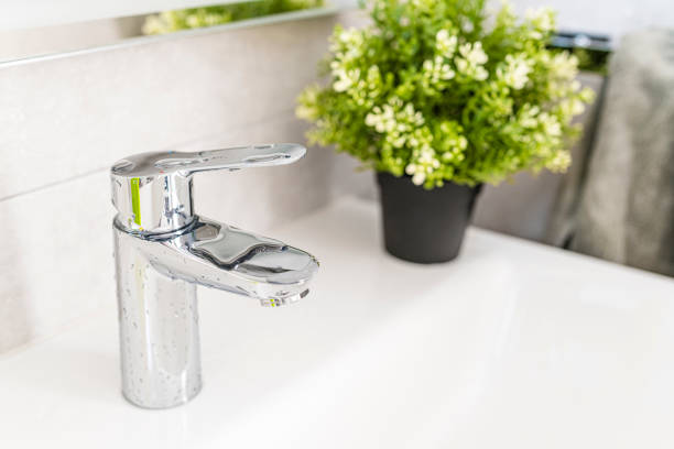 Clean chrome bathroom faucet. High resolution 42Mp indoors digital capture taken with SONY A7rII and Zeiss Batis 40mm F2.0 CF lens