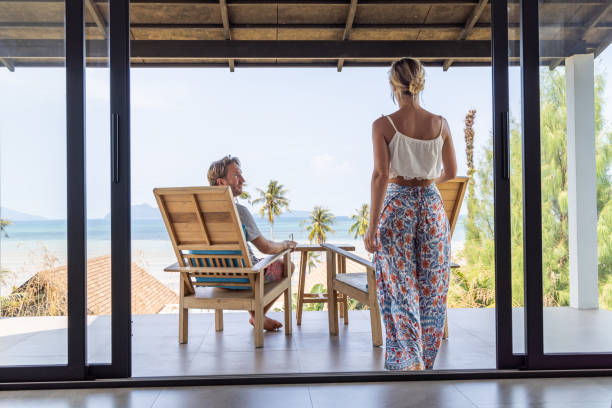 istock Couple Enjoying Ocean View from Balcony 2152893986