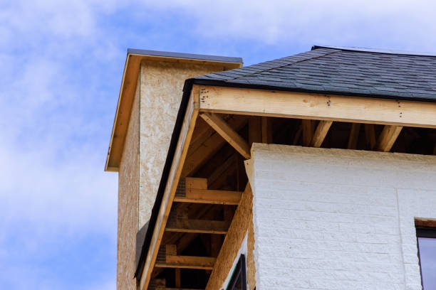 istock As house is under construction, joist framework gutter holders a soffit fascia trim is being installed 2152899160