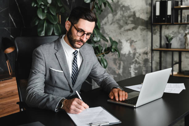 istock Managerial work performed by young businessman in modern office. 2152901352