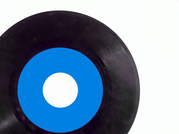 istock 45 rpm vinyl record on a white background with copy space 2152901629
