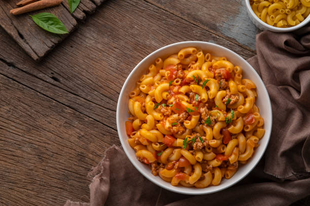istock Stir fried macaroni with tomatoes sauce and mince pork on a plate. 2152905382