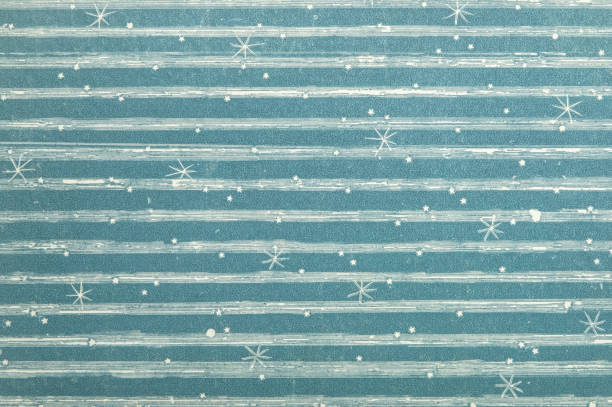 White lines and stars are depicted on a light blue historical background.\n(A old book cover made at the beginning of the 20th century).