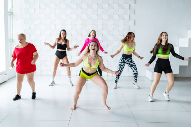 istock Women dancing zumba 2152910614