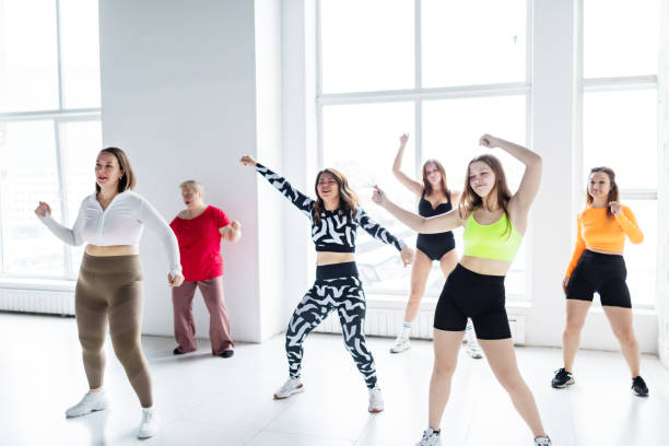 istock Women dancing zumba 2152910753