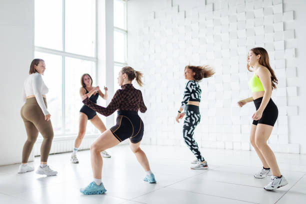 istock Women dancing zumba 2152910800