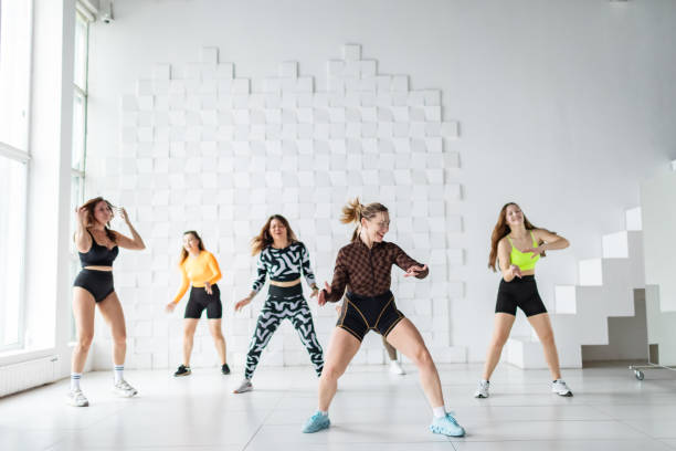 istock Women dancing zumba 2152910818