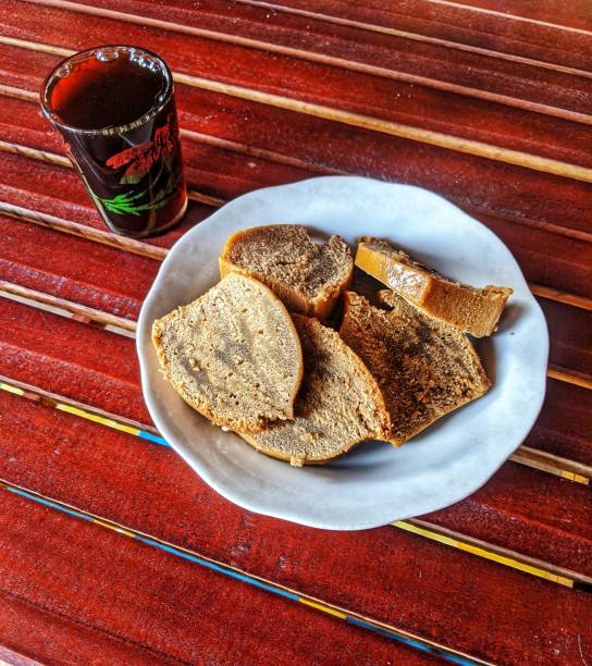 Continental breakfast on the picnic table. weekend morning concept.