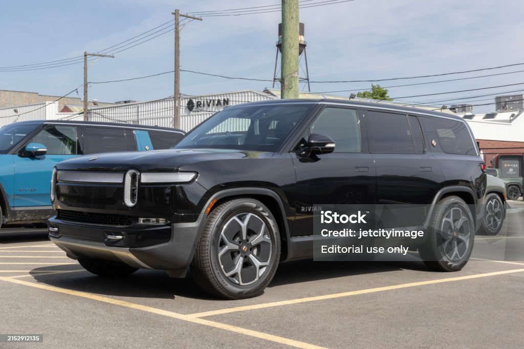 Rivian R1S SUV display. Rivian offers the R1S in Adventure, Adventure All-Terrain and Launch editions. MY:2024 Chicago - May 12, 2024: Rivian R1S SUV display. Rivian offers the R1S in Adventure, Adventure All-Terrain and Launch editions. MY:2024 Rivian Stock Photo Rivian R1S SUV display. Rivian offers the R1S in Adventure, Adventure All-Terrain and Launch editions. MY:2024 Chicago - May 12, 2024: Rivian R1S SUV display. Rivian offers the R1S in Adventure, Adventure All-Terrain and Launch editions. MY:2024 Rivian Stock Photo