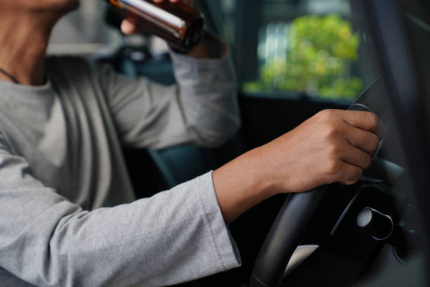 istock That's a dangerous thing to do. Drinking beer while driving is both illegal and unsafe. 2152913917