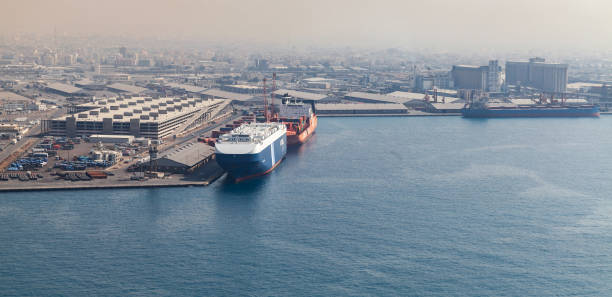 Jeddah, Saudi Arabia - December 22, 2019: Jeddah port on a daytime, aerial view with cargo ships at container terminal