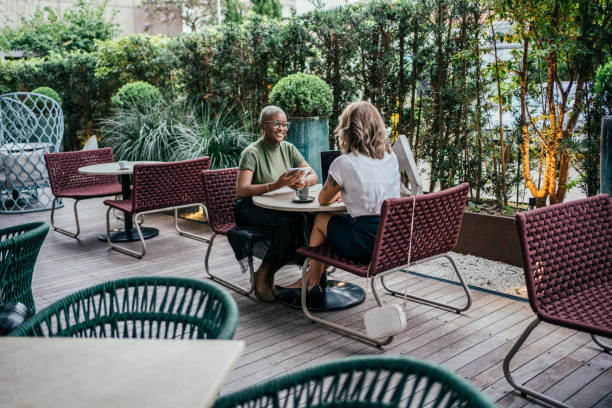 istock Business women discussing a project at the hotel cafe 2152923352