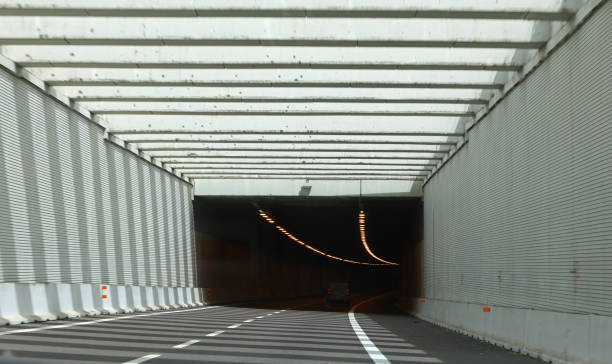 istock Highway tunnel with minimal traffic and noise barrier 2152923567