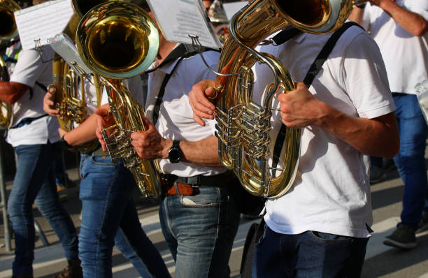istock french horn players in a marching band performing 2152923678