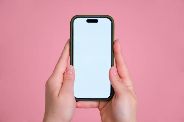 istock A person hands are holding a cell phone with a blank screen 2152924019