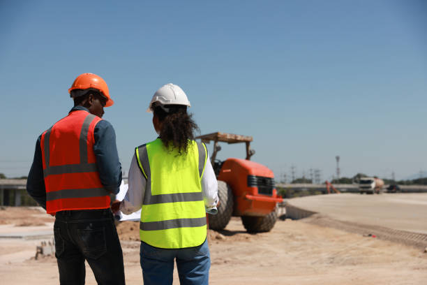 istock Engineers are having a meeting regarding the new construction phase. two construction workers sitting together at the site 2152927216