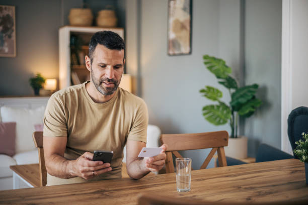 istock A man is shopping online at home 2152927933