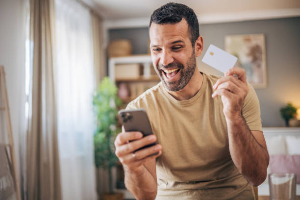 istock A man is shopping online at home 2152928243