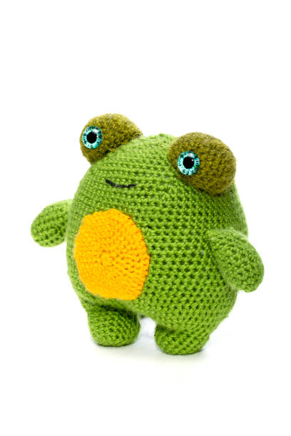 istock The frog is a soft knitted wool toy made of wool on a white background 2152928766