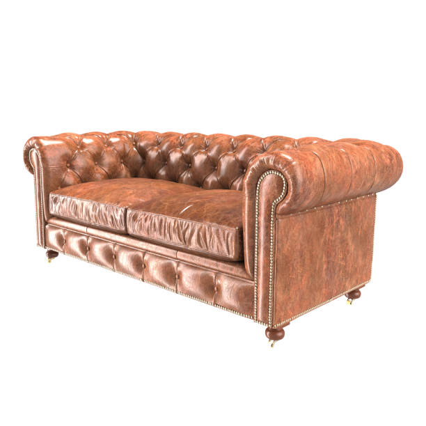 istock Arafed leather couch with buttoned arms and a wooden frame. 2152934308