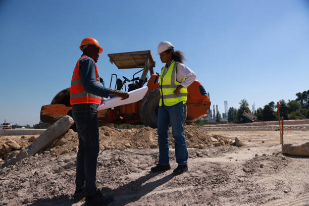 istock Engineers are having a meeting regarding the new construction phase. two construction workers sitting together at the site 2152940604