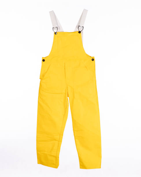 yellow garden overalls isolated on white background