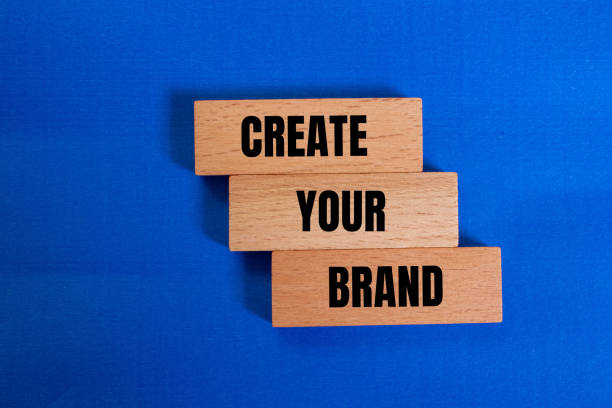 istock Create your brand words written on wooden blocks with blue background 2152945053