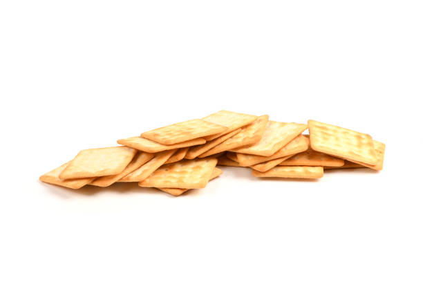 Single salted cracker isolated on white