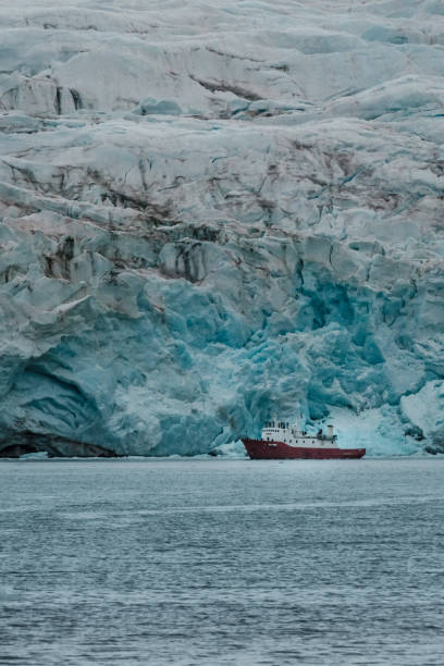 istock Expedition ship near massive glacier in Longyearbyen, Svalbard 2152946491