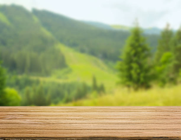 istock Wooden table with mountain background for product display 2152949032