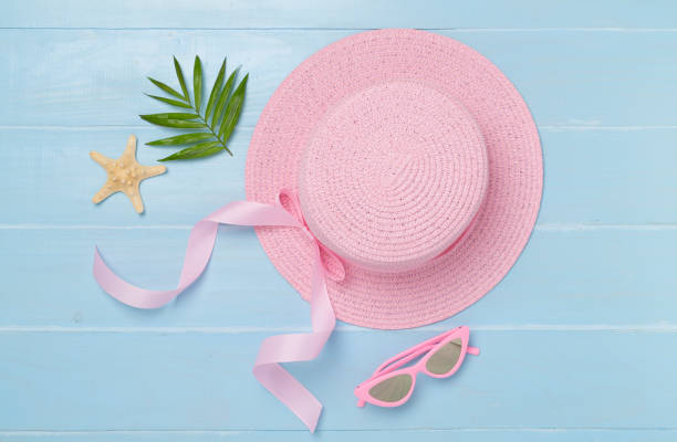 istock Pink hat on wooden background, top view. Summer concept 2152949084
