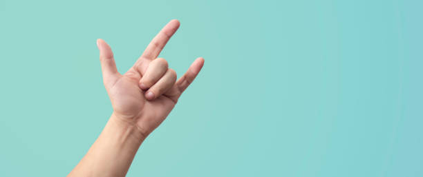 istock Hand gesturing sign of love and rock 2152949486