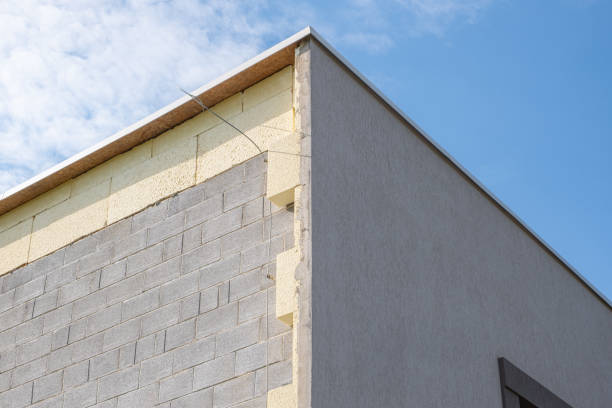 istock modern thermal insulation materials. building New House in process insulation of the wall of the house with layers Exterior covering in construction site. 2152951266
