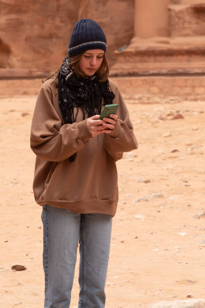 istock Young girl with her mobile 2152953981