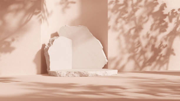 istock Soft peach 3D background, stone podium with shadow from tree leaves 2152956187