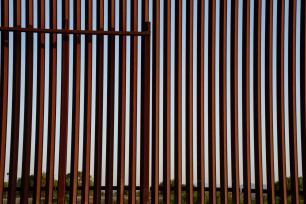 istock International Border Wall at Tornillo Crossing in Texas At Dusk 2152957977