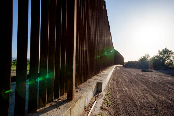 istock International Border Wall at Tornillo Crossing in Texas At Dusk 2152958101