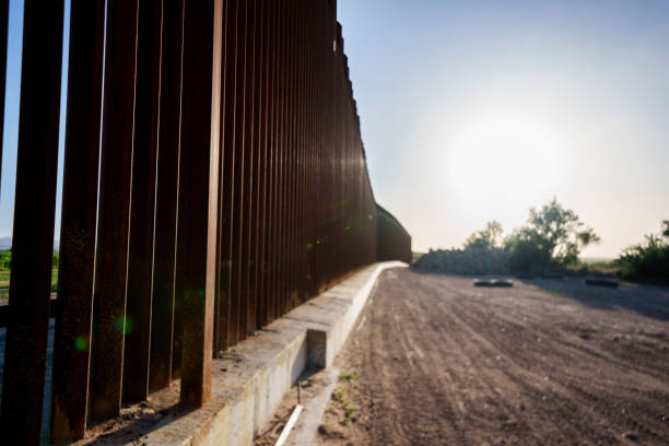 istock International Border Wall at Tornillo Crossing in Texas At Dusk 2152958189