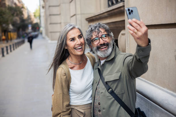 istock Mature couple on vacation taking selfies 2152959759