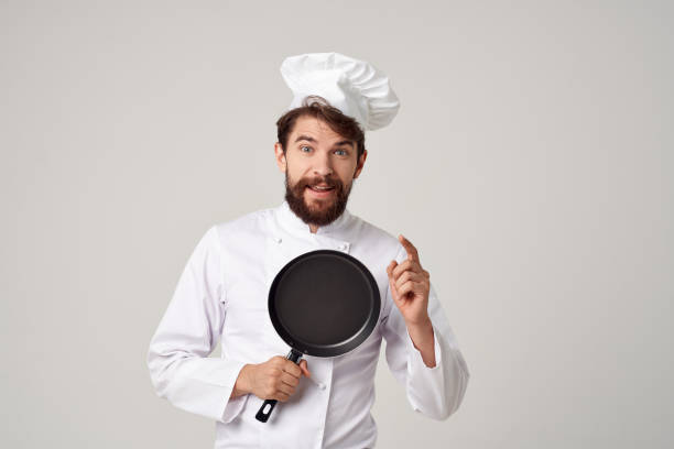 istock male cook kitchen utensils Job Professional 2152962803