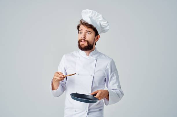 istock male chef kitchenware cooking service job 2152963567