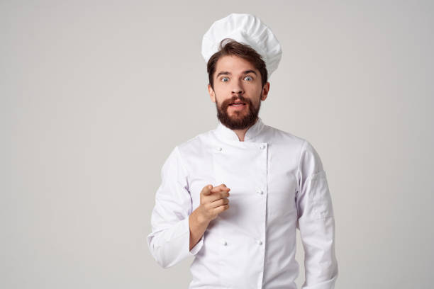 istock male cook Chef uniform Cooking emotions gourmet isolated background 2152966270
