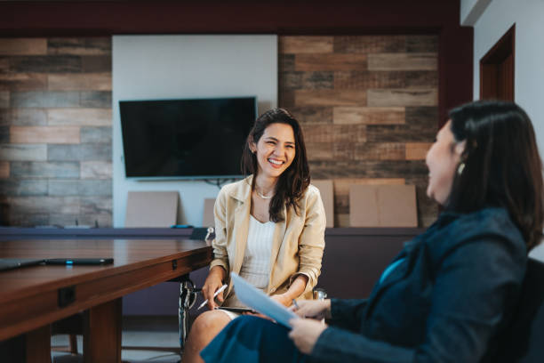 istock Smiling businesswomen interacting 2152966645