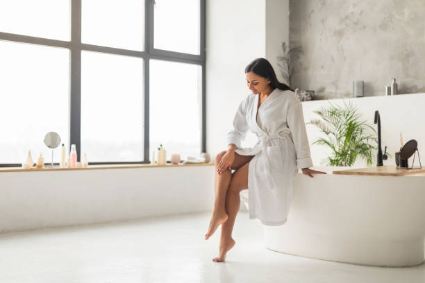 istock Pretty Eastern Lady Touching Perfect Smooth Legs After Depilation 2152967326