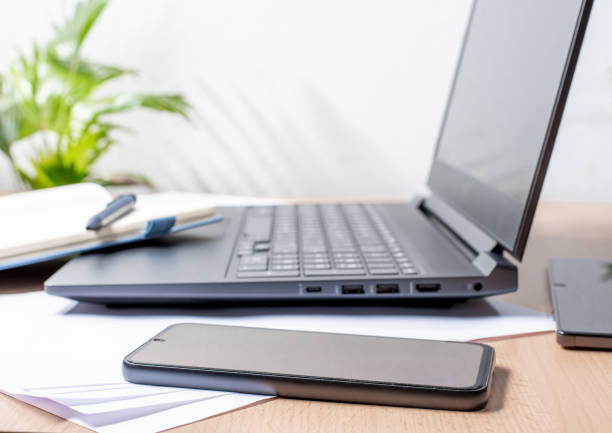 istock Office equipment on a wooden table close-up 2152968599