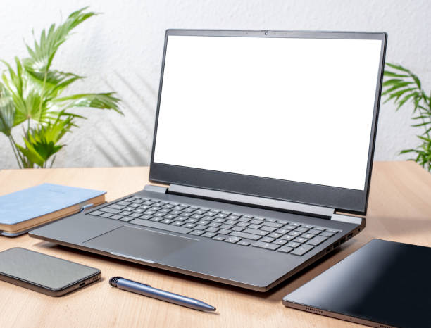 istock Office equipment on wooden table closeup, white mockup 2152968602