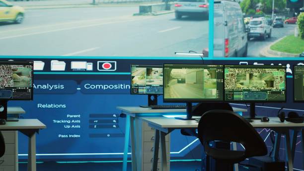 istock Empty observation room office with CCTV surveillance footage on a big screen 2152970550